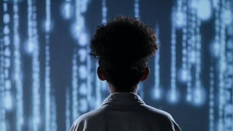 Photo by Ron Lach : https://www.pexels.com/photo/back-view-of-a-teen-boy-with-a-digital-background-9783350/