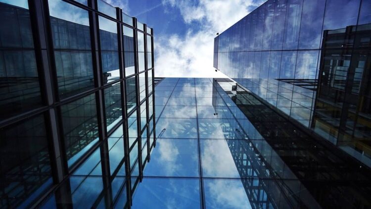 Photo by SevenStorm JUHASZIMRUS: https://www.pexels.com/photo/worm-s-eye-view-of-glass-building-443399/