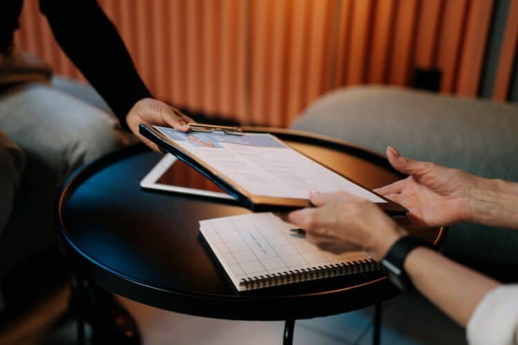Photo by cottonbro studio: https://www.pexels.com/photo/person-in-black-long-sleeve-shirt-writing-on-white-paper-5989926/