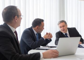 Photo by Kampus Production: https://www.pexels.com/photo/men-in-black-suit-working-together-8428054/