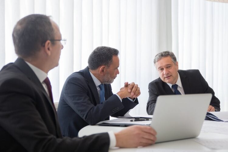 Photo by Kampus Production: https://www.pexels.com/photo/men-in-black-suit-working-together-8428054/