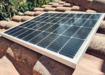 Photo by Kindel Media: https://www.pexels.com/photo/a-solar-panel-on-roof-tiles-9875445/