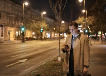 Photo by Andrea Piacquadio: https://www.pexels.com/photo/serious-male-with-bag-messaging-on-cellphone-3932419/