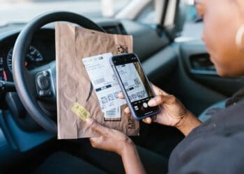 Photo by RDNE Stock project: https://www.pexels.com/photo/person-holding-a-cellphone-and-parcel-7362883/