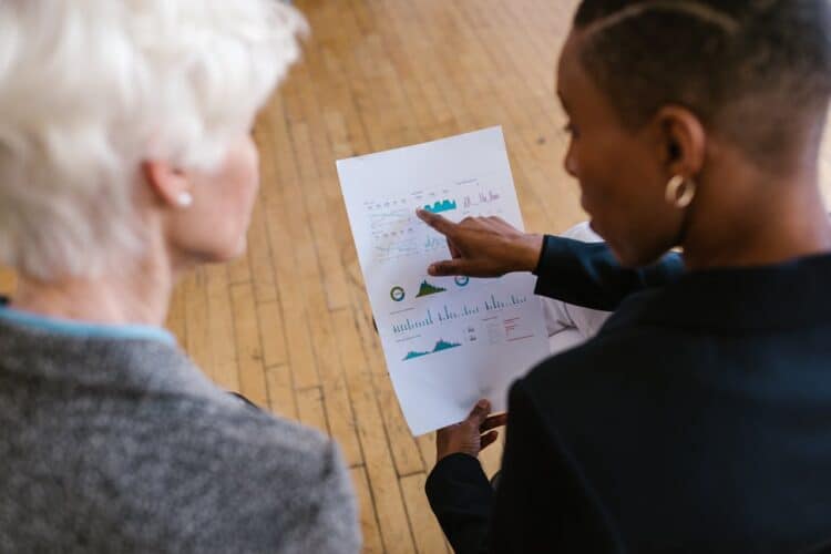 Photo by RDNE Stock project: https://www.pexels.com/photo/woman-pointing-finger-on-a-white-paper-with-graphs-7414286/