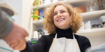 Photo by Kampus Production: https://www.pexels.com/photo/cafe-employee-wearing-an-apron-shaking-hands-with-a-person-6684795/
