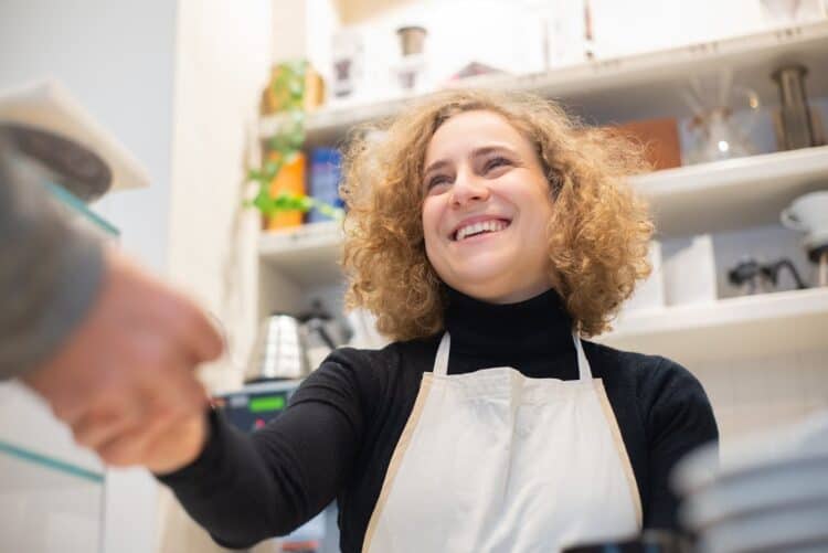 Photo by Kampus Production: https://www.pexels.com/photo/cafe-employee-wearing-an-apron-shaking-hands-with-a-person-6684795/