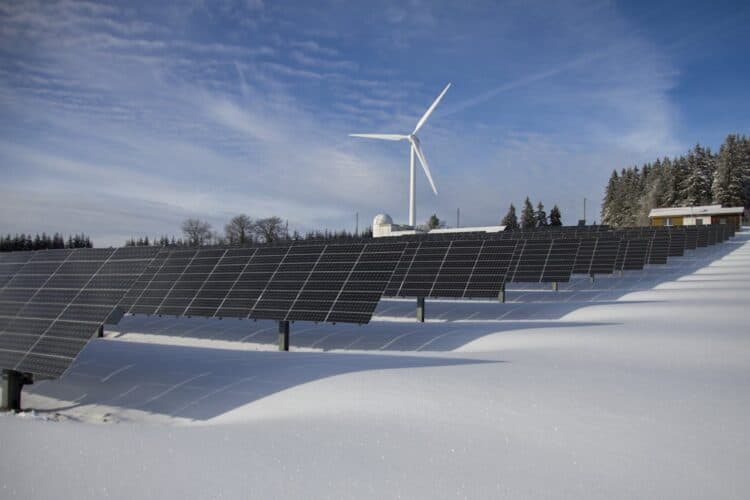 Photo by Pixabay: https://www.pexels.com/photo/solar-panels-on-snow-with-windmill-under-clear-day-sky-433308/