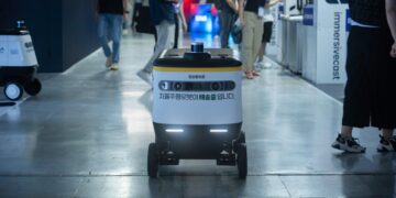 Photo by Youn Seung Jin: https://www.pexels.com/photo/autonomous-delivery-robot-at-tech-conference-32778343/