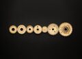 Photo by Miguel Á. Padriñán from Pexels: https://www.pexels.com/photo/photo-of-golden-cogwheel-on-black-background-3785927/
