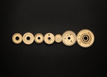 Photo by Miguel Á. Padriñán from Pexels: https://www.pexels.com/photo/photo-of-golden-cogwheel-on-black-background-3785927/