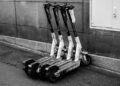 Photo by SHOX art: https://www.pexels.com/photo/black-and-white-image-of-parked-electric-scooters-34265538/