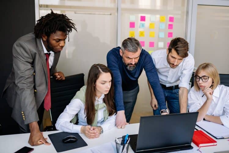Photo by Yan Krukau: https://www.pexels.com/photo/a-team-looking-at-a-laptop-7793702/