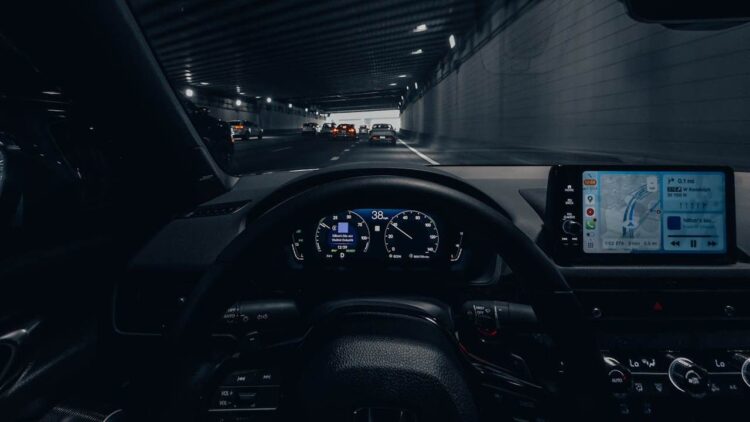 Photo by Allen Boguslavsky: https://www.pexels.com/photo/driving-through-city-tunnel-at-night-with-gps-32560104/