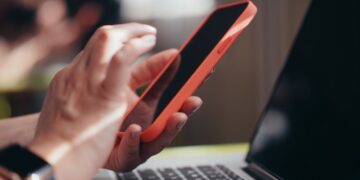 Photo by Kindel Media: https://www.pexels.com/photo/a-person-holding-a-smartphone-7054530/