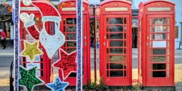 Photo by Mike N: https://www.pexels.com/photo/festive-phone-booths-in-ripon-england-34790061/