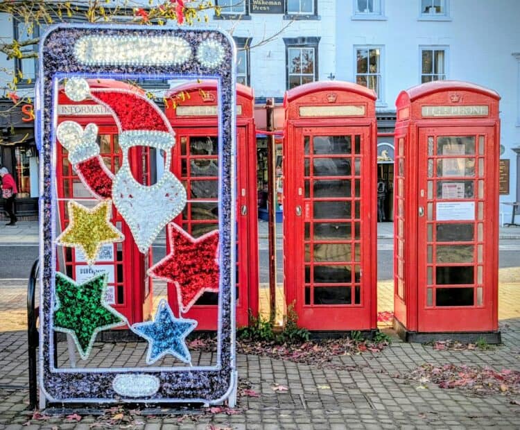 Photo by Mike N: https://www.pexels.com/photo/festive-phone-booths-in-ripon-england-34790061/