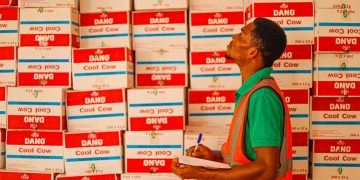 Photo by Lagos Food Bank Initiative: https://www.pexels.com/photo/man-working-in-a-warehouse-walking-and-looking-at-stack-of-boxes-with-a-notepad-8069551/