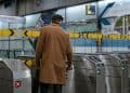 Photo by MART  PRODUCTION from Pexels: https://www.pexels.com/photo/a-person-in-brown-coat-entering-a-subway-automated-ticket-barrier-7251095/
