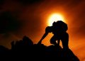 Photo by stein egil liland: https://www.pexels.com/photo/sun-over-silhouette-of-man-rock-climbing-20040806/