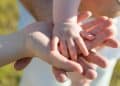 Photo by Samuel Dostál from Pexels: https://www.pexels.com/photo/close-up-photo-of-baby-s-hand-on-parent-s-hands-6540658/