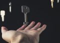 Photo by Bastian Riccardi from Pexels: https://www.pexels.com/photo/floating-keys-above-open-hand-on-black-background-29222872/