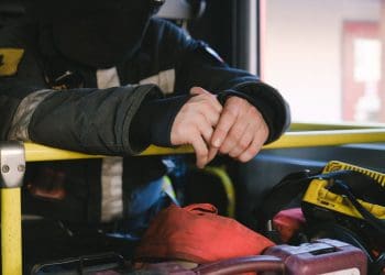 Photo by Anna Shvets from Pexels: https://www.pexels.com/photo/firefighter-inside-of-a-fire-truck-5965198/