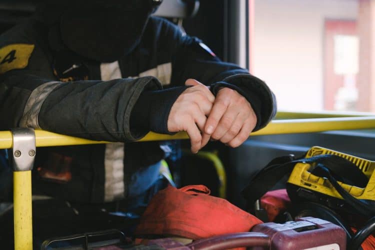 Photo by Anna Shvets from Pexels: https://www.pexels.com/photo/firefighter-inside-of-a-fire-truck-5965198/