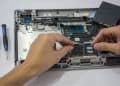 Photo by Elias Gamez from Pexels: https://www.pexels.com/photo/a-hand-fixing-the-internal-parts-of-a-laptop-10558598/