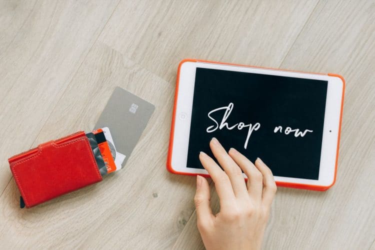 Photo by Nataliya Vaitkevich from Pexels: https://www.pexels.com/photo/a-close-up-shot-of-a-digital-tablet-beside-credit-cards-6214152/
